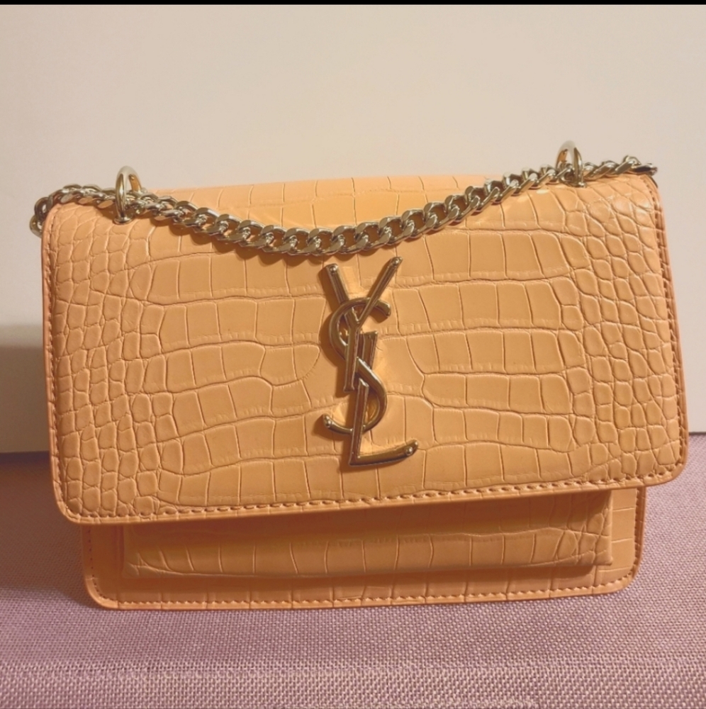 Pink crocodile purse